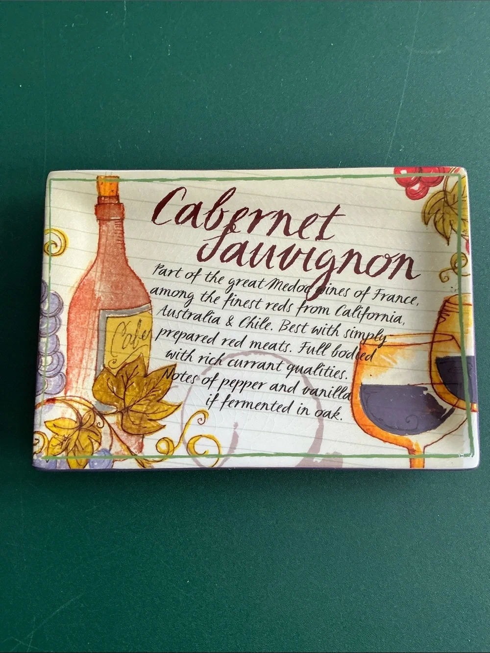 Four Grasslands Road wine-themed appetizer plates, vintage-style wine labels